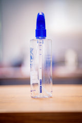 Labocosmetica Maatfles + Trigger product- en toepassingsfoto